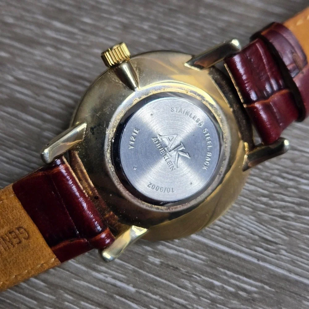 Anne Klein Womens Gold Tone Watch V121E MOP Dial Leather Band Working 7